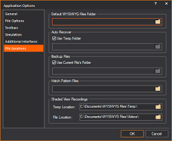  “Lighting designer using WYSIWYG R38 to preview truss and LED wall setup.”