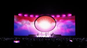  “Lighting designer using WYSIWYG R38 to preview truss and LED wall setup.”